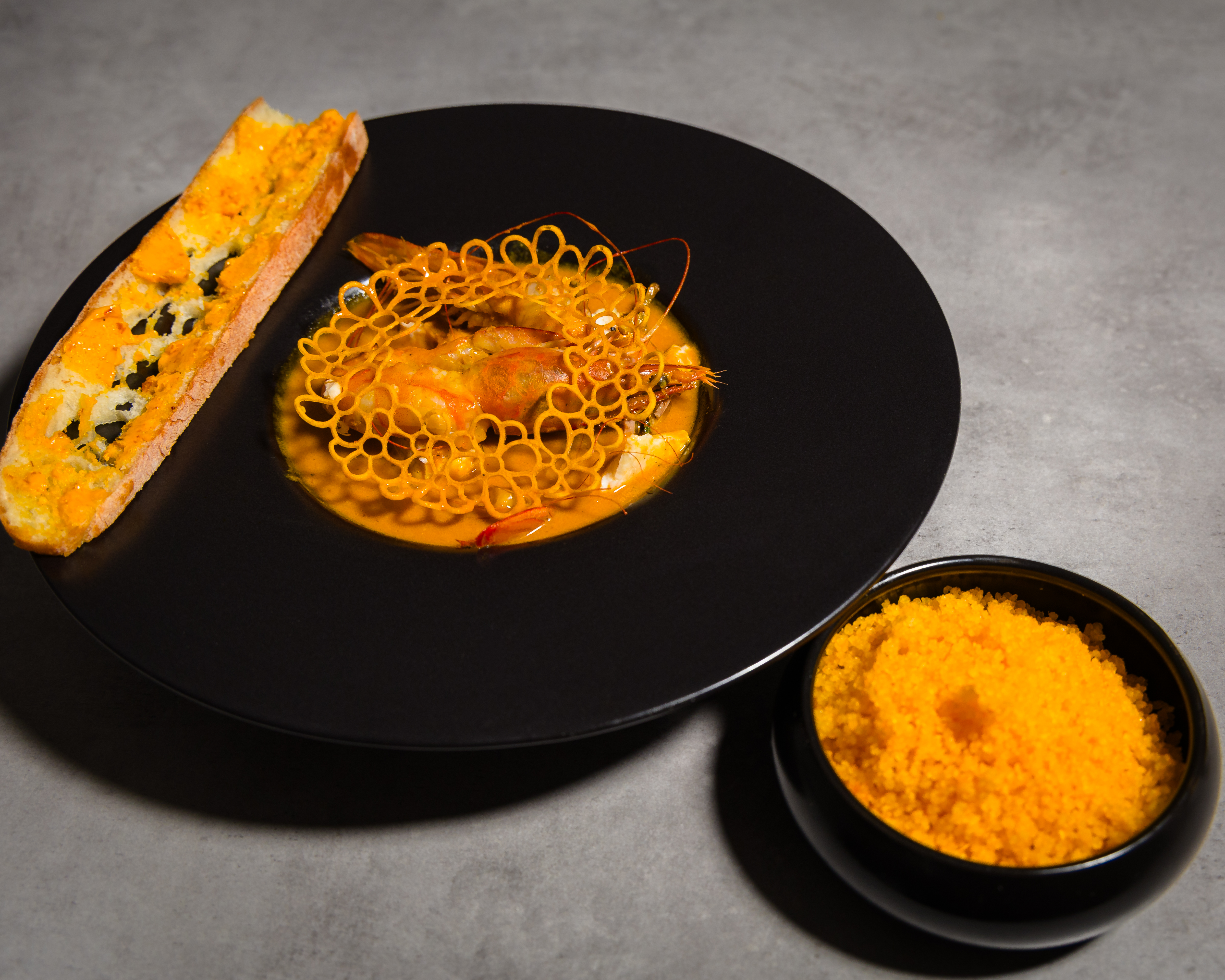Soupe du pêcheur et son attiéké huile rouge